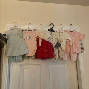 Assorted newborn and 0-3 month clothes